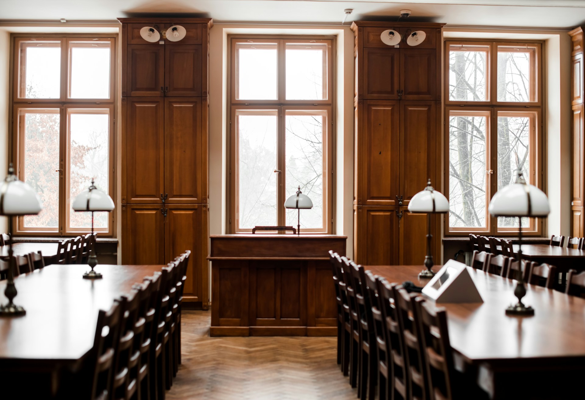Traditional courtroom setting with wooden furniture, representing expert witness qualifications in a legal environment.